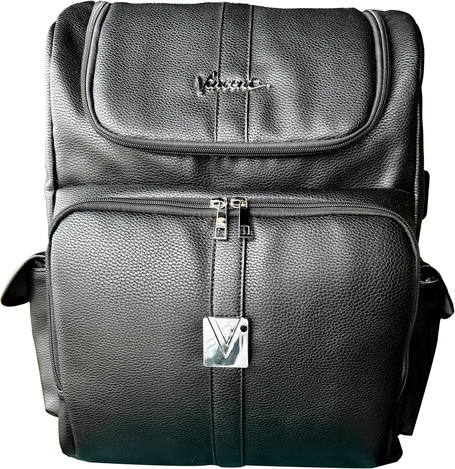 Minimalist black vegan leather barber backpack featuring multiple tool compartments.