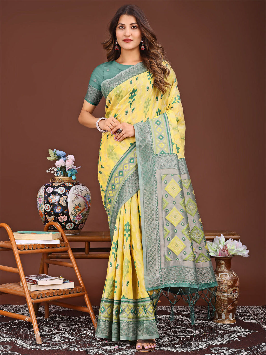 Yellow linen cotton saree with a contrasting green blouse piece