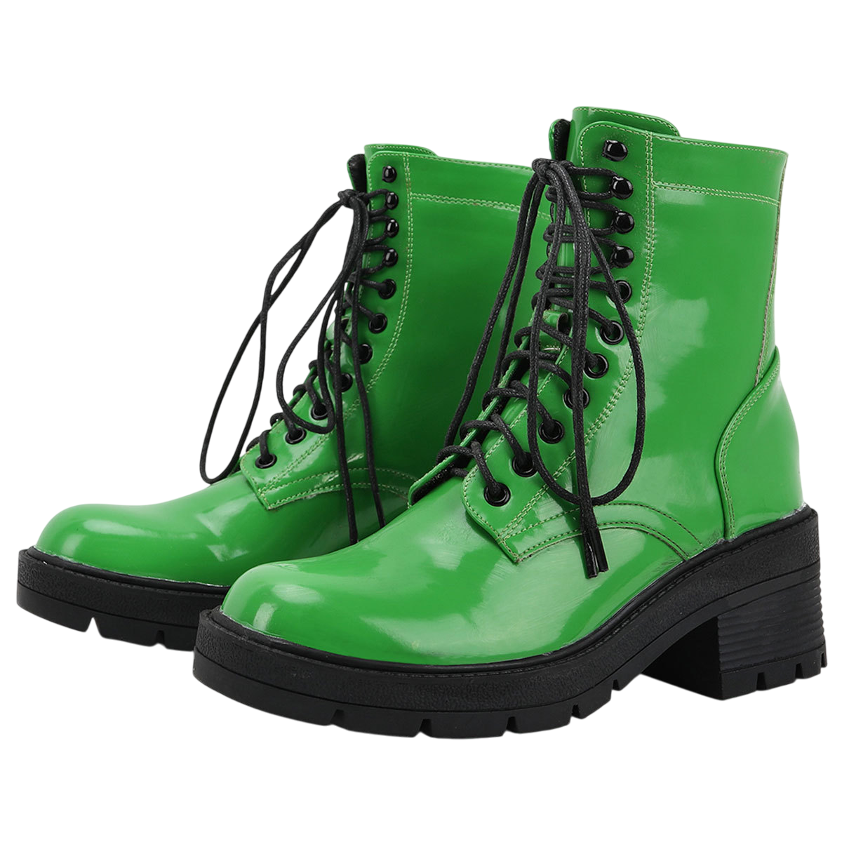 A pair of bright green and black patent leather combat boots with chunky lug soles.