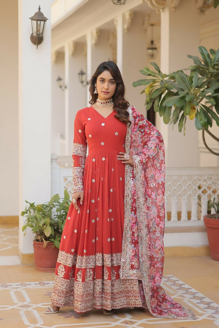 Jyoti Fashion orange faux georgette Anarkali dress with intricate gold sequins and zari embroidery, floor-length style.