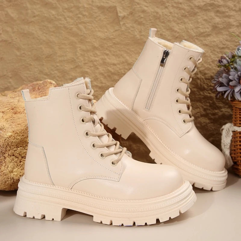 Pair of cream Harajuku style women's thick-soled combat ankle boots with lace-up front and side zipper, shown on and off a model.
