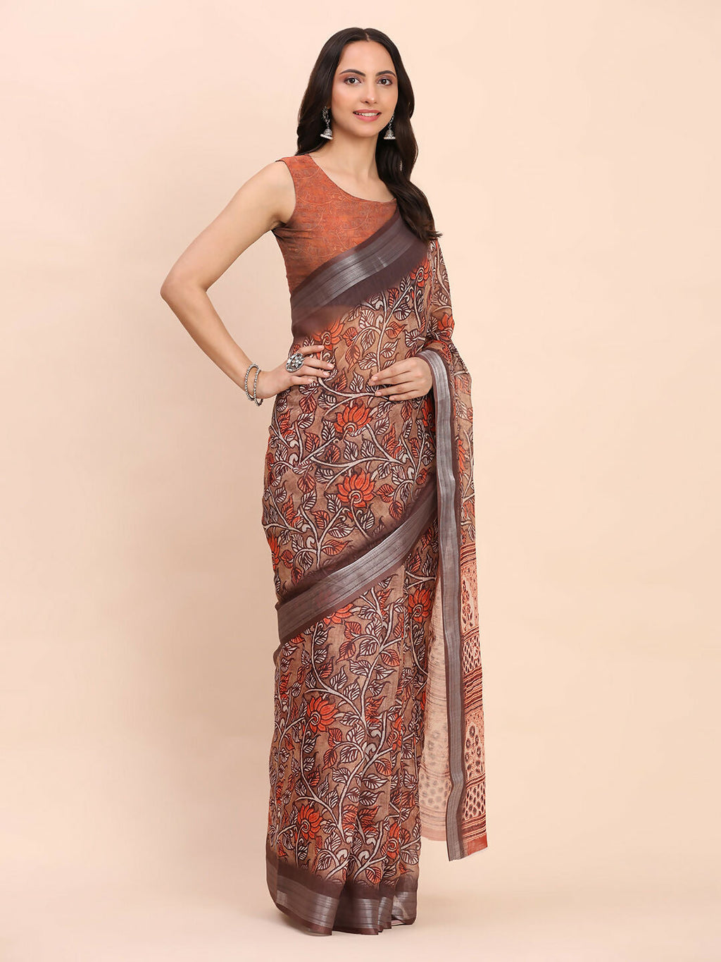 Shree Shyam Fashion brown linen cotton saree with an orange blouse