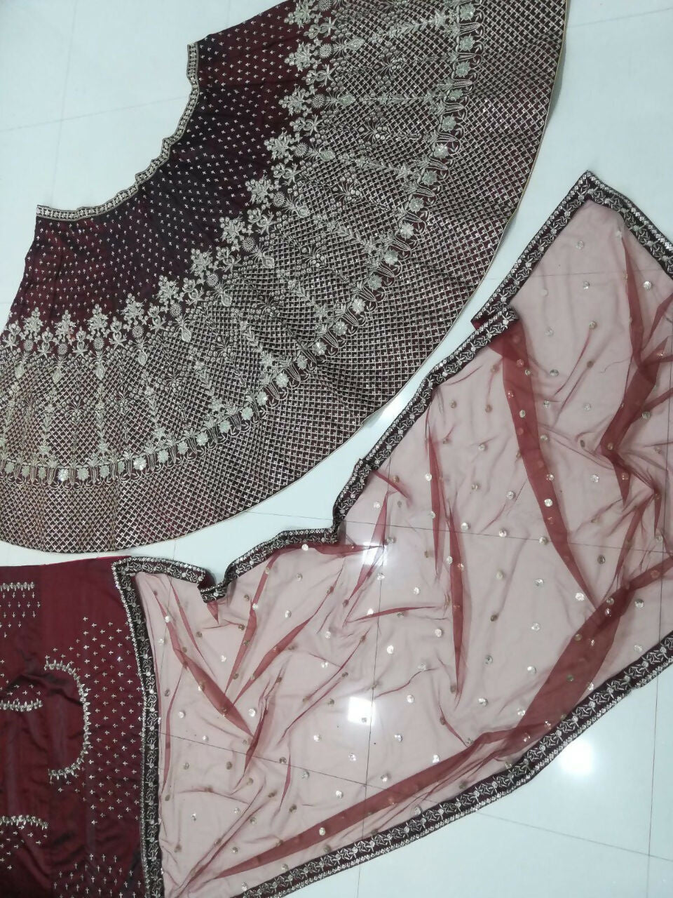 Maroon Taffeta Satin Silk Lehenga Choli with Sequins and Zari