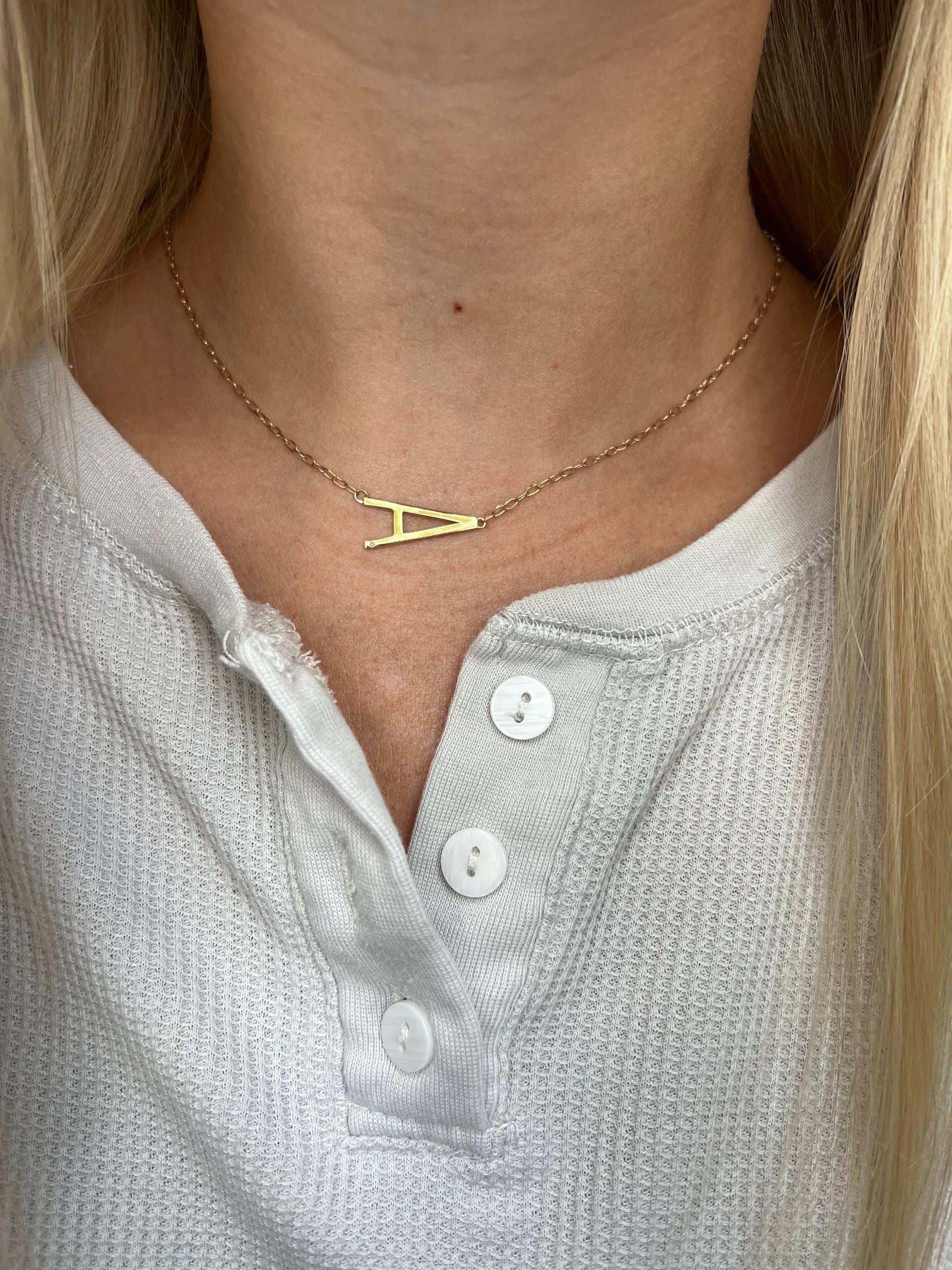 Initial A Sideways Pendant Necklace with Cubic Zirconia Accent