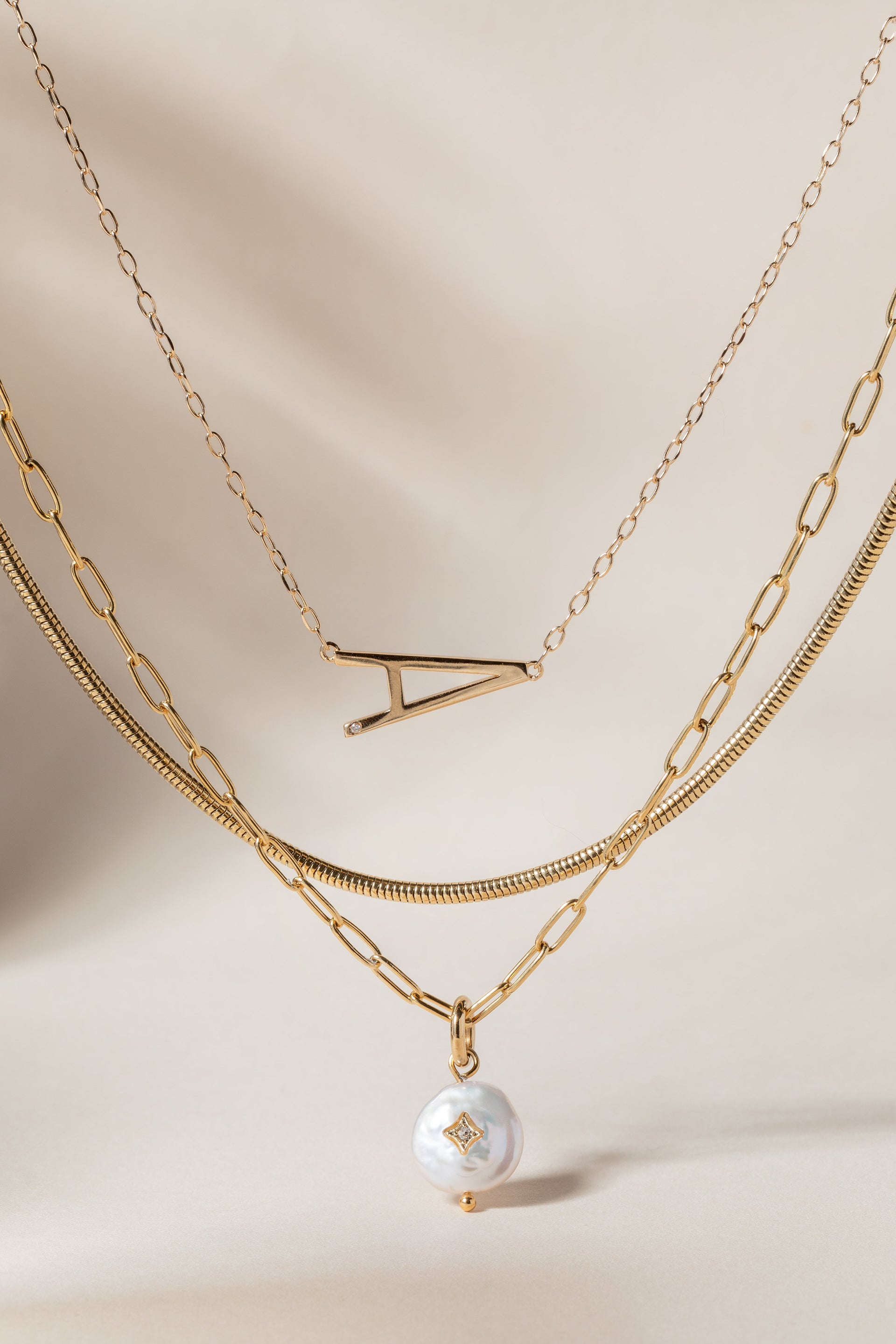 Initial A Sideways Pendant Necklace with Cubic Zirconia Accent