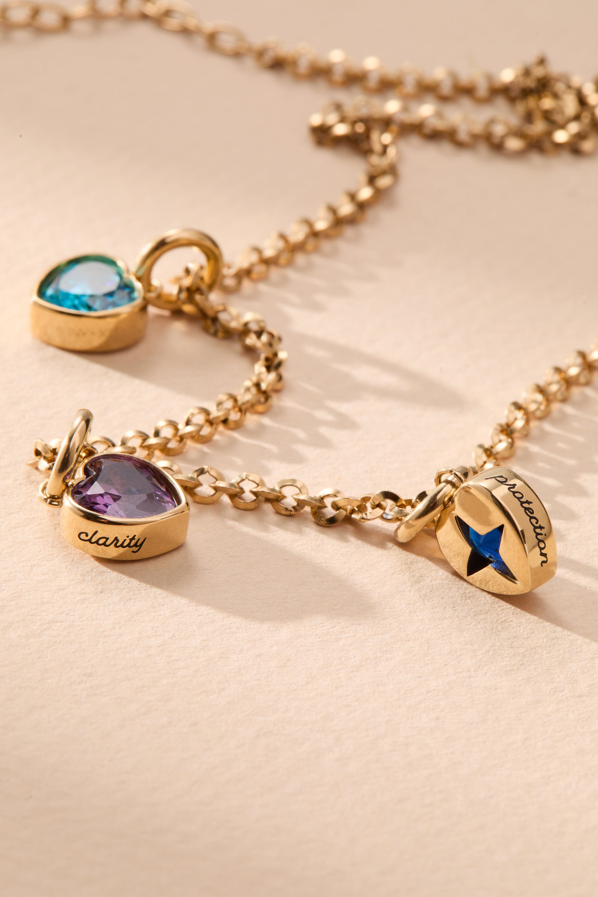 September Birthstone Heart Charm in Gold with Sapphire Blue Crystal