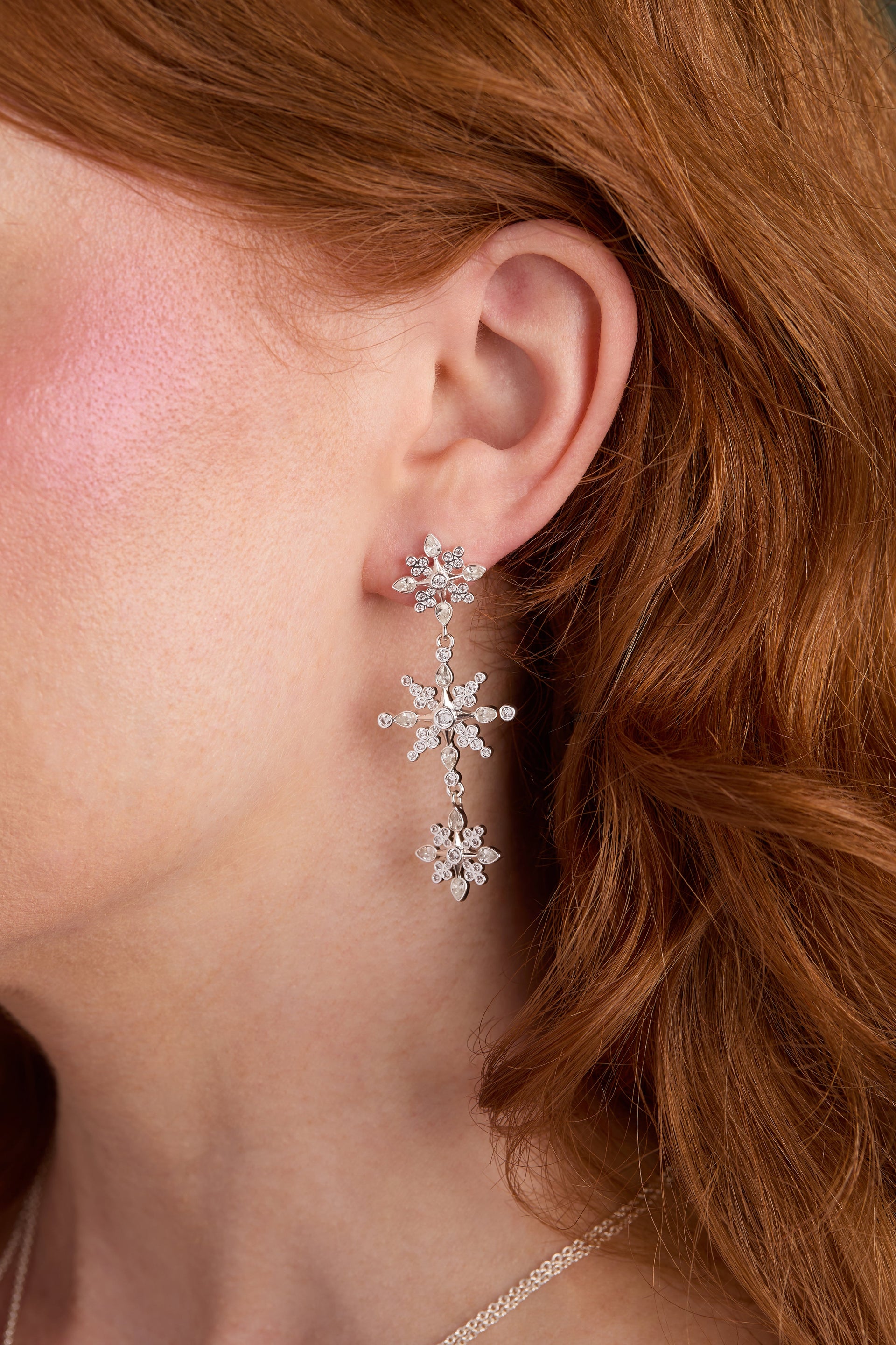Crystal Snowflake Linear Drop Earrings in Silver and Clear