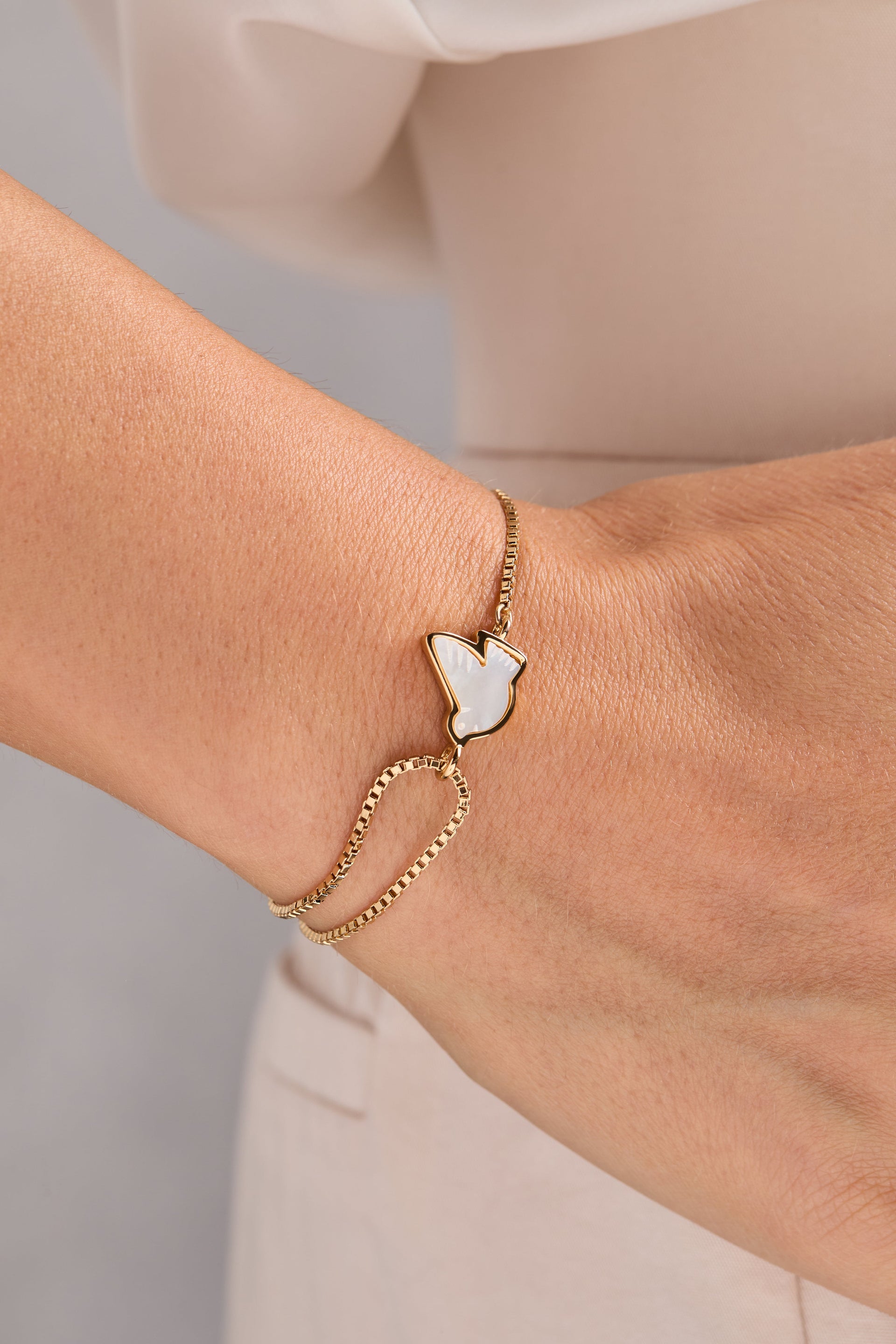 Dove Peace Mother of Pearl Pull Chain Bracelet in Gold Plated