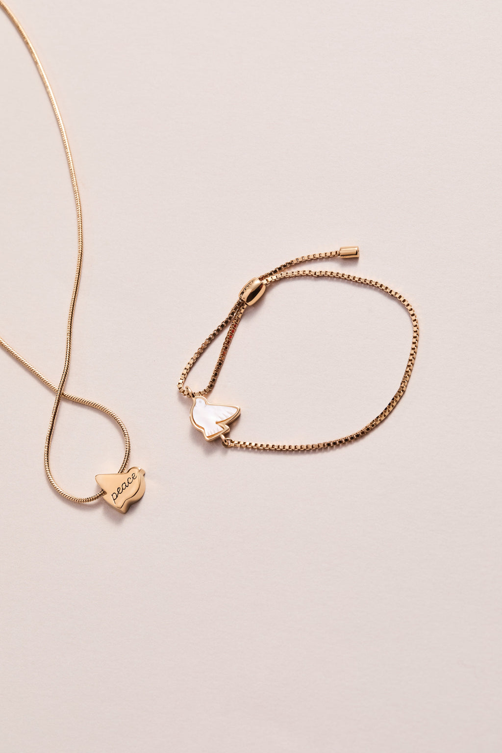 Dove Peace Mother of Pearl Pull Chain Bracelet in Gold Plated