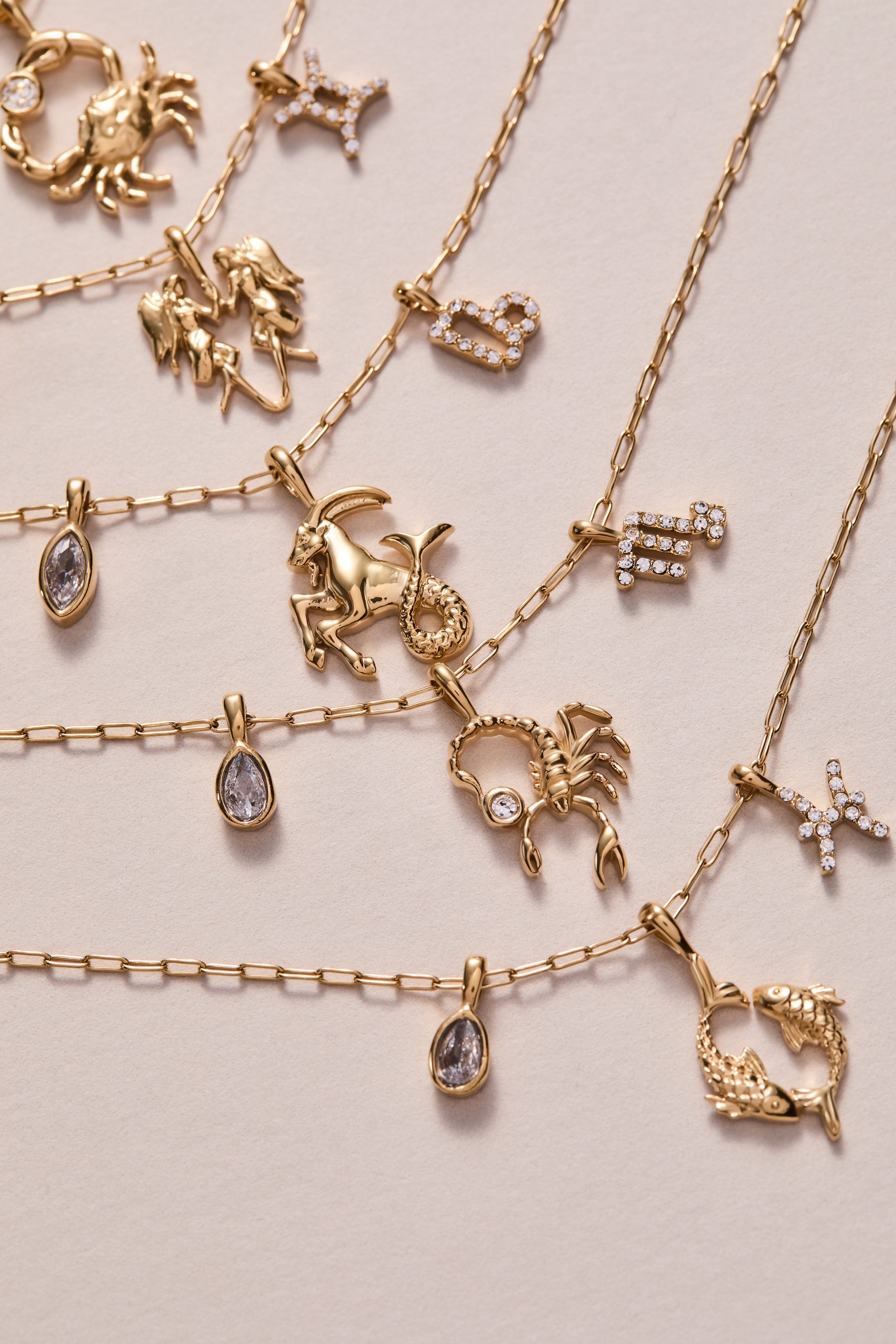 Pisces Zodiac Charm Cluster Necklace in Gold-Plated Stainless Steel
