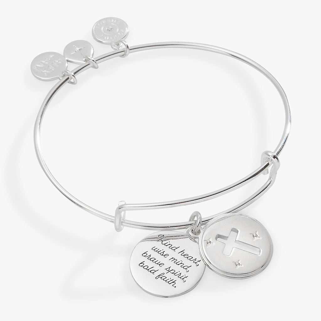 Silver affirmation bangle featuring a crystal-embellished cross charm with a hidden message.
