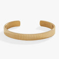 Gold-tone textured cuff bracelet with ribbed detail