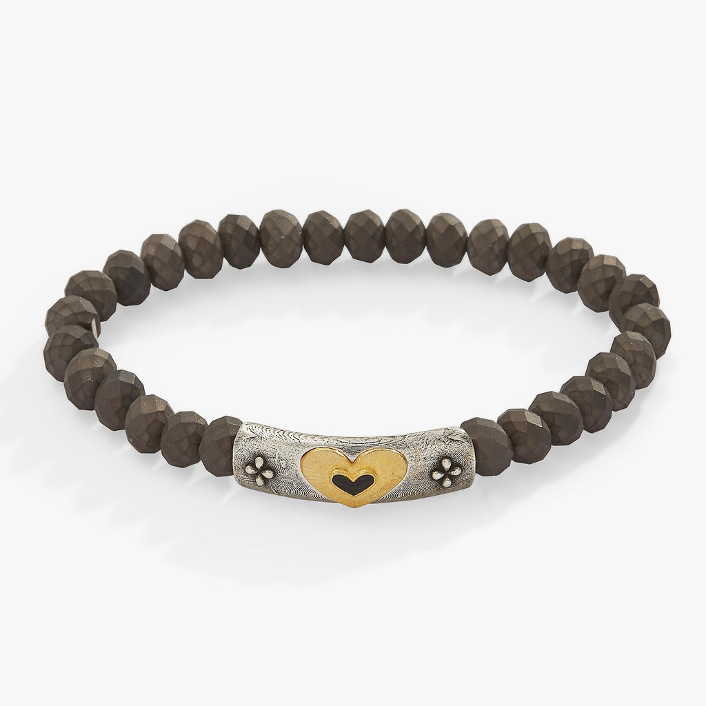 Antique heart charm bracelet with matte brown textured glass beads and black epoxy detail.