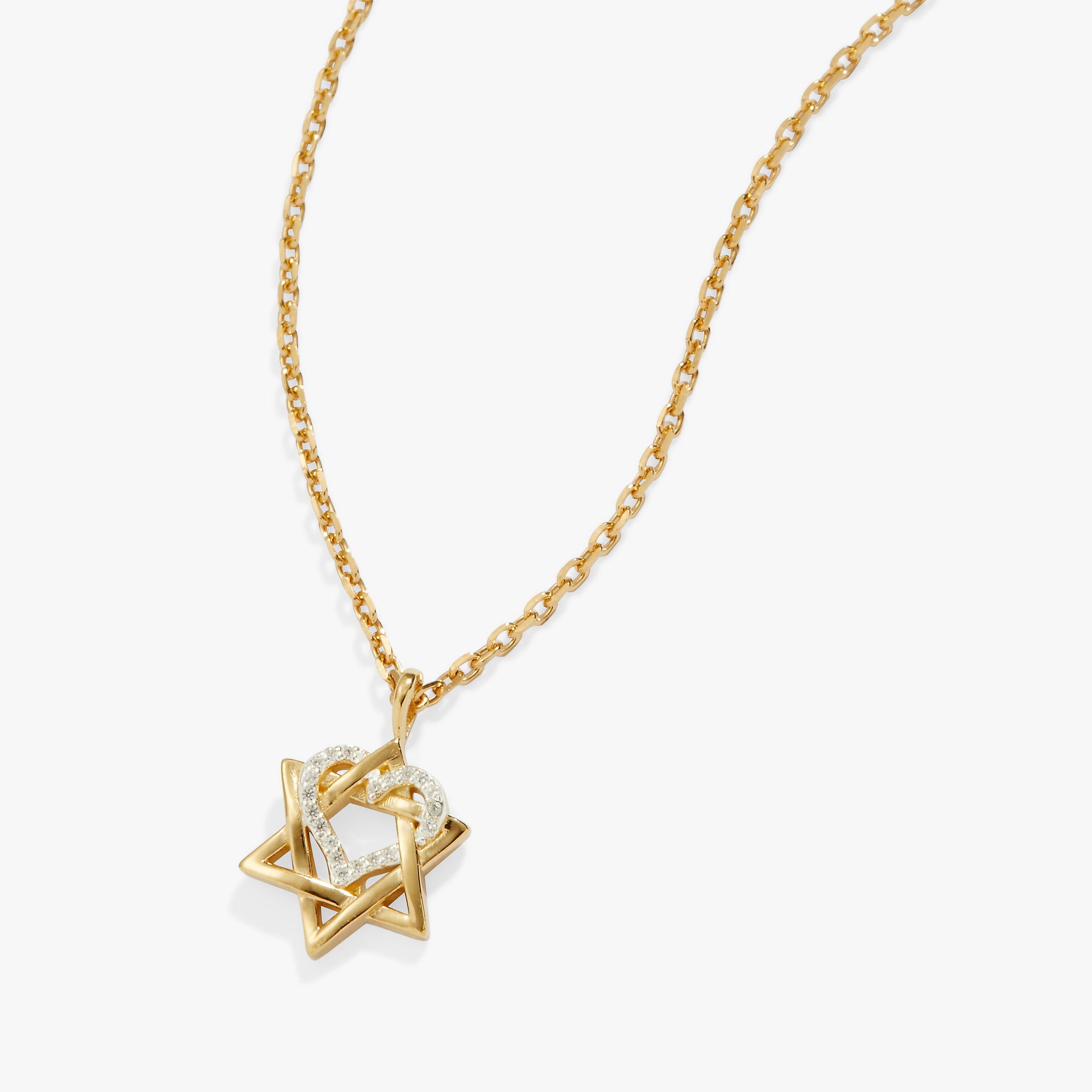 Crystal-encrusted silver heart intertwined with a 14kt gold-plated Star of David pendant on a gold chain.