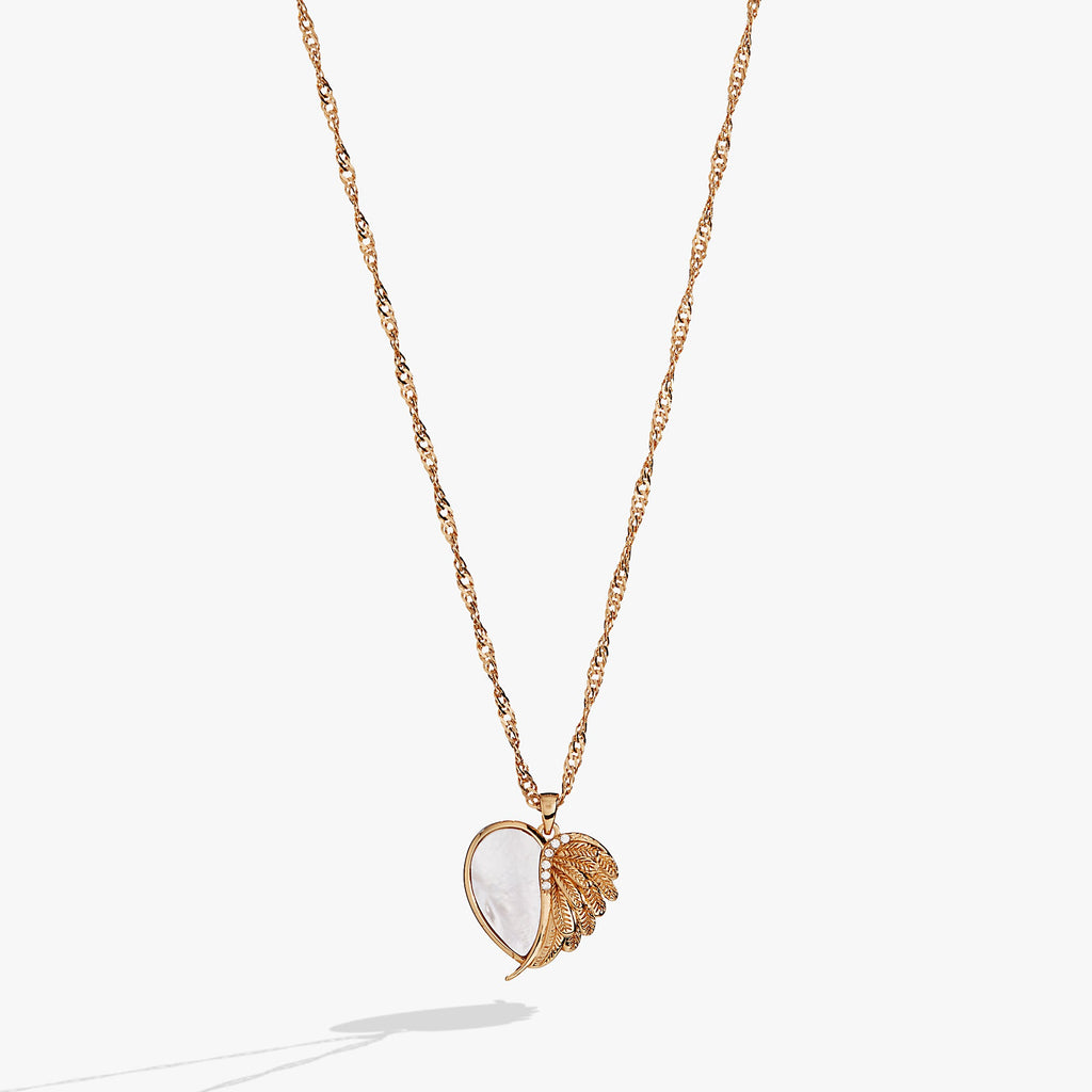 Heart-shaped charm necklace with Mother of Pearl and angel wing detail featuring glass crystals.
