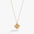 Elegant adjustable four-leaf clover pendant necklace representing good luck.