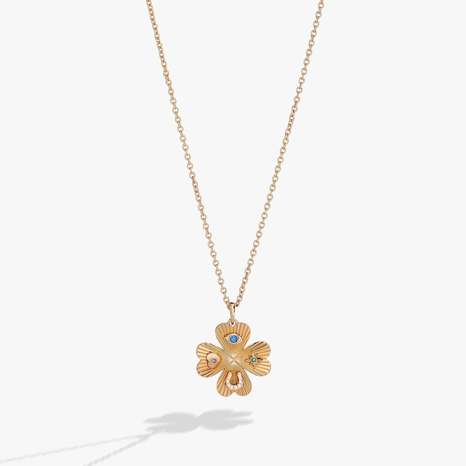 Elegant adjustable four-leaf clover pendant necklace representing good luck.