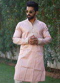 Stylish baby pink silk kurta set for boys with unique coding work detailing.