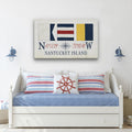 Nantucket maritime flag canvas wall art with GPS coordinates in navy, red, yellow, and white.
