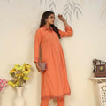 Women wearing a vibrant orange straight-fit Rinkal cotton kurti with side pockets and a collar V-neck.