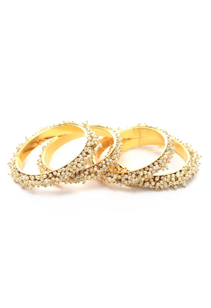 Elegant golden bangle set with off-white pearls for women