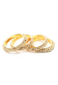 Elegant golden bangle set with off-white pearls for women