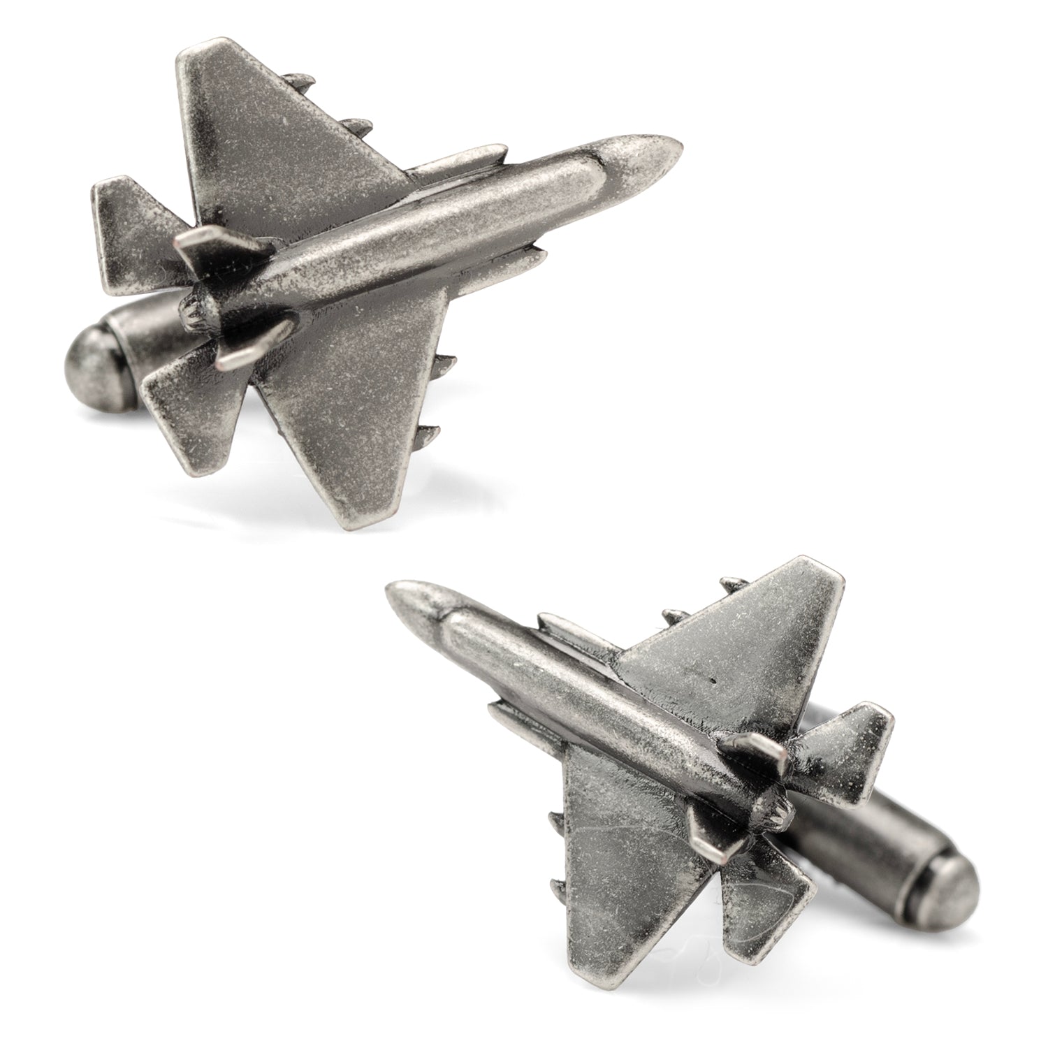 A pair of 3D military jet fighter plane cufflinks with an antiqued silver finish displayed on a white background and on a shirt cuff.