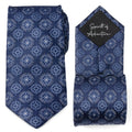 Navy blue mens necktie with white compass pattern and Spirit of Adventure text on the reverse side