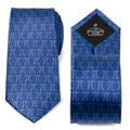 Close up of a blue necktie with a repeating grey Pi symbol pattern against a white background.
