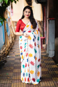 White Poly Georgette saree with maple leaf print and mirror work border