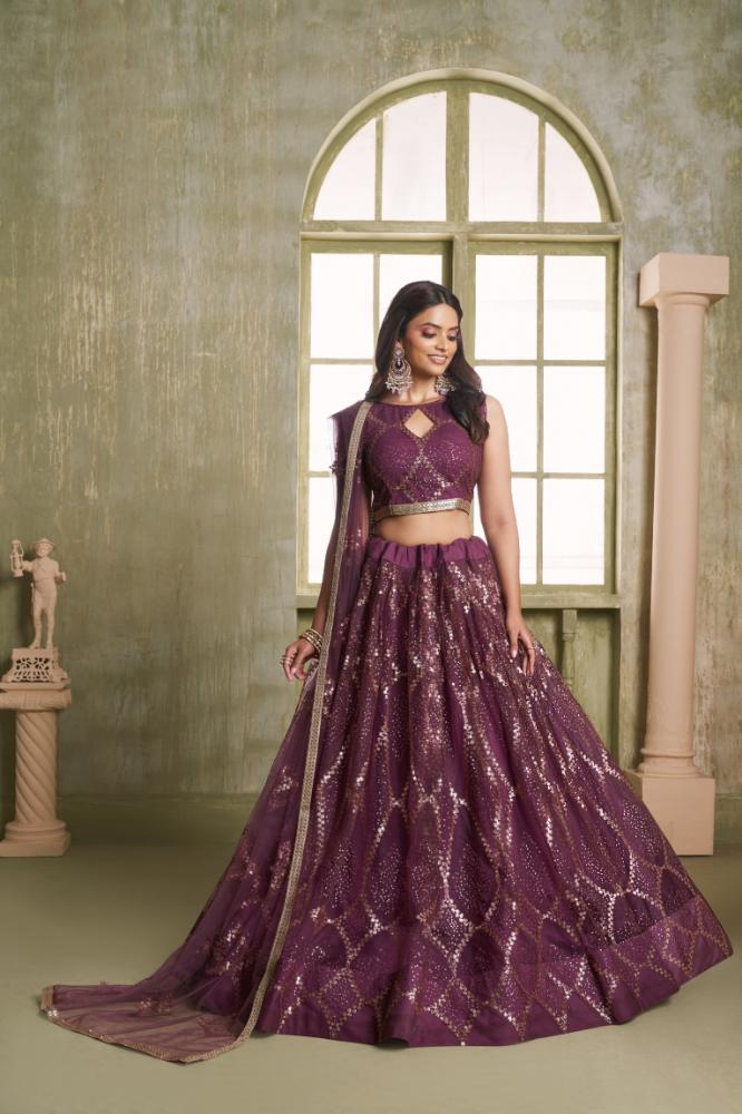 Elegant wine-colored butterfly net lehenga choli with matching tone-to-tone embroidery.