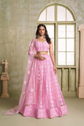 Pink Butterfly Net wedding lehenga choli with tone-to-tone embroidery and sequence work.