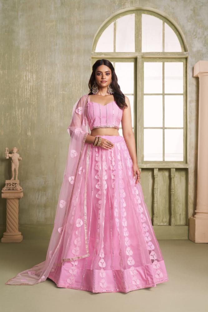 Pink Butterfly Net wedding lehenga choli with tone-to-tone embroidery and sequence work.