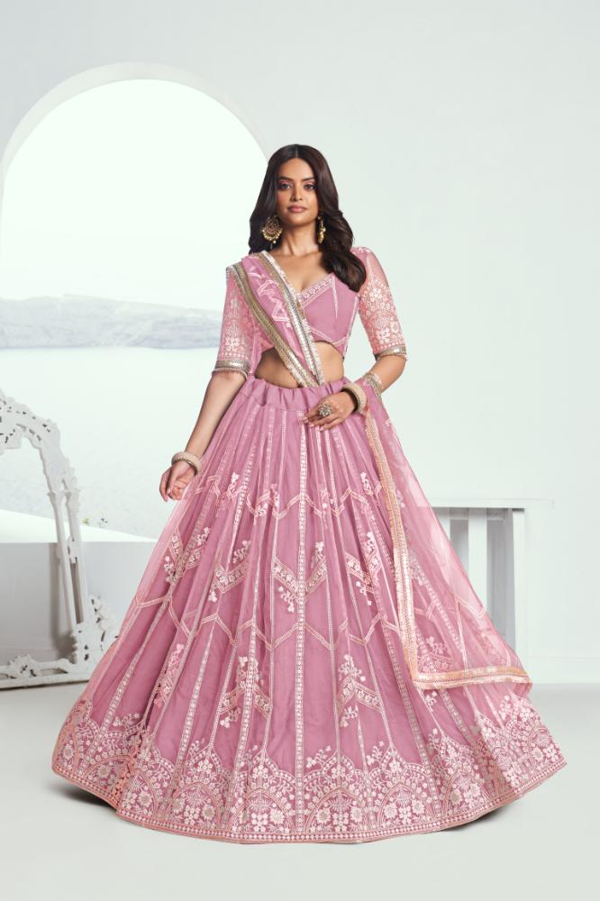 Pink Butterfly Net lehenga choli with white cotton thread and sequence embroidery for wedding wear.