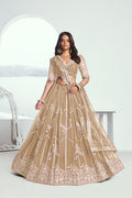 Chiku beige butterfly net lehenga choli with intricate white embroidery for weddings.