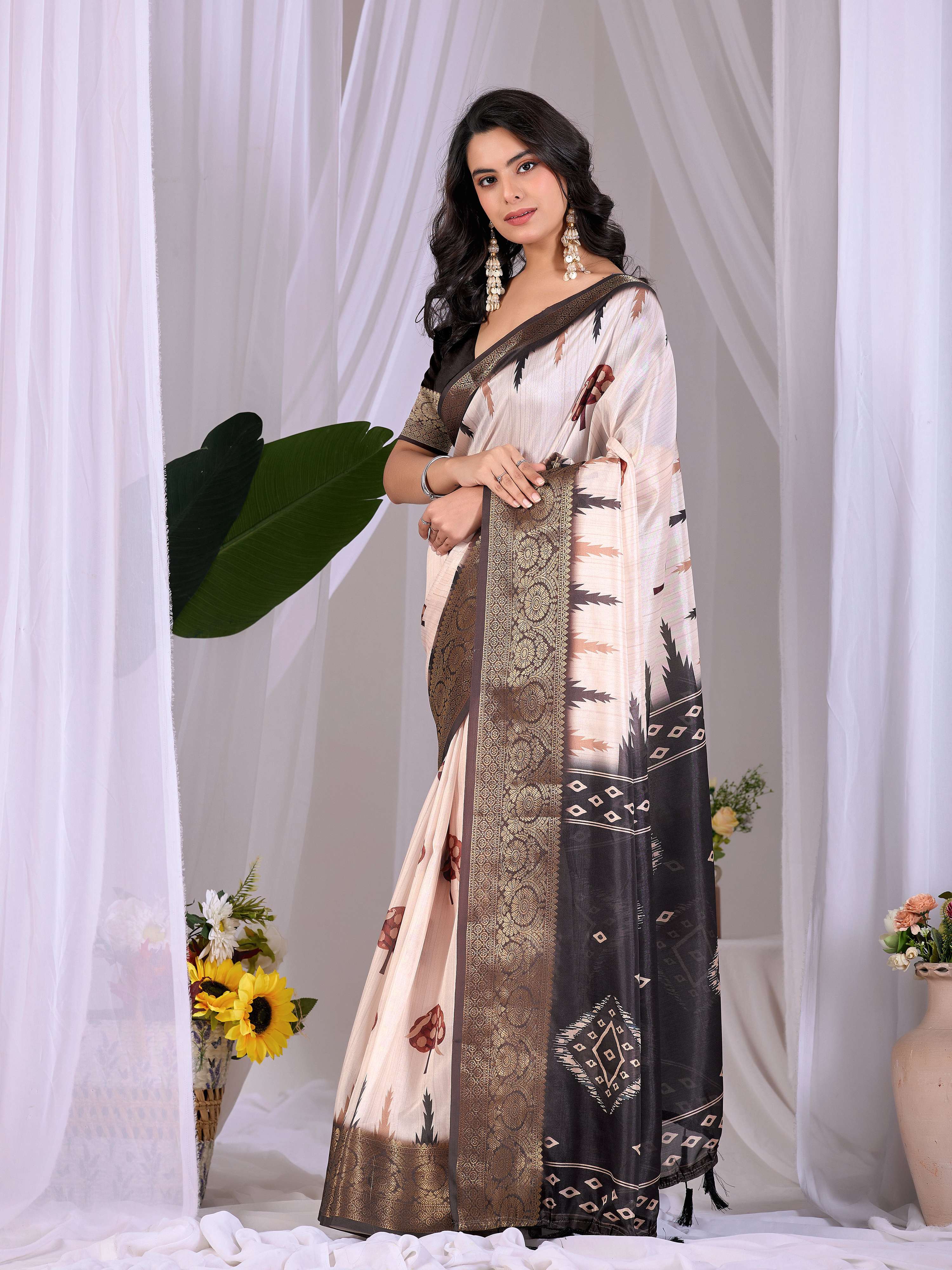 Cream soft lichi silk printed saree with a contrasting black blouse