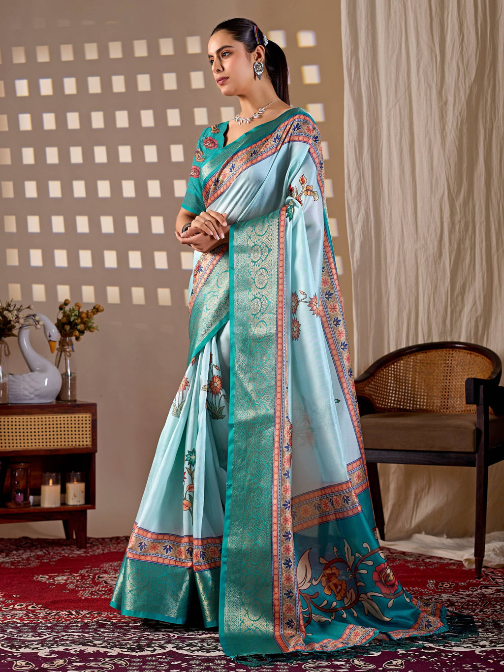 Aastha Fashion Aqua Soft Lichi Silk Printed Saree with matching blouse piece