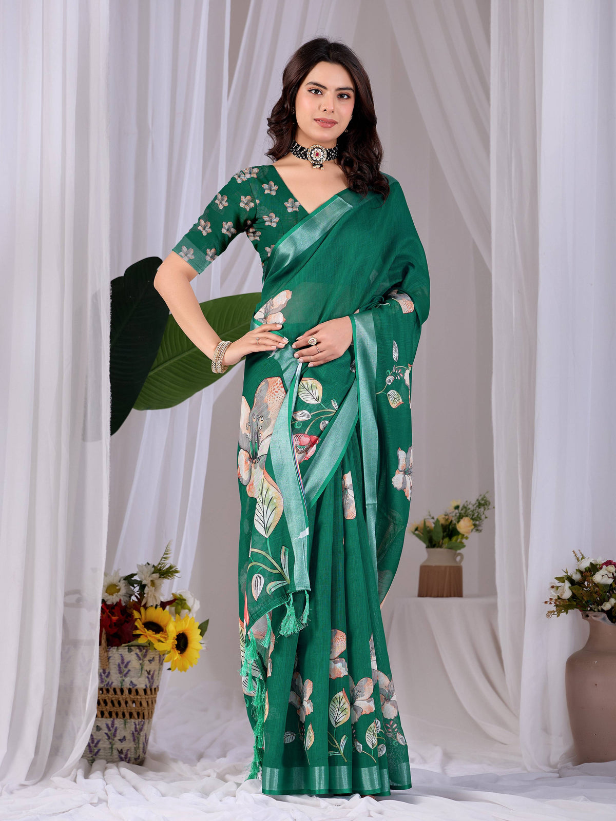 A classic Green soft linen cotton printed saree with a matching blouse piece
