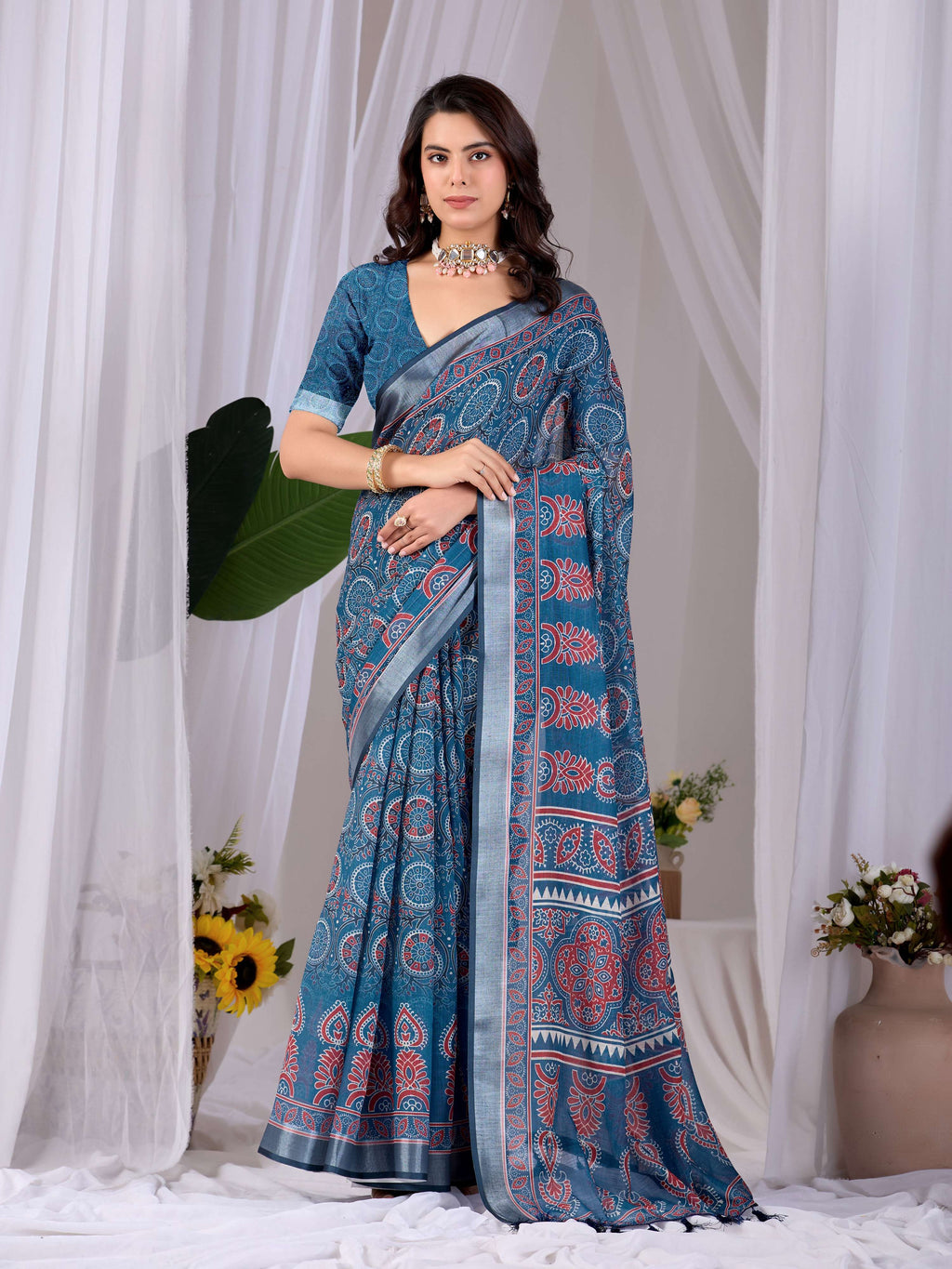 A beautiful Teal Blue soft linen cotton printed saree with a matching blouse piece