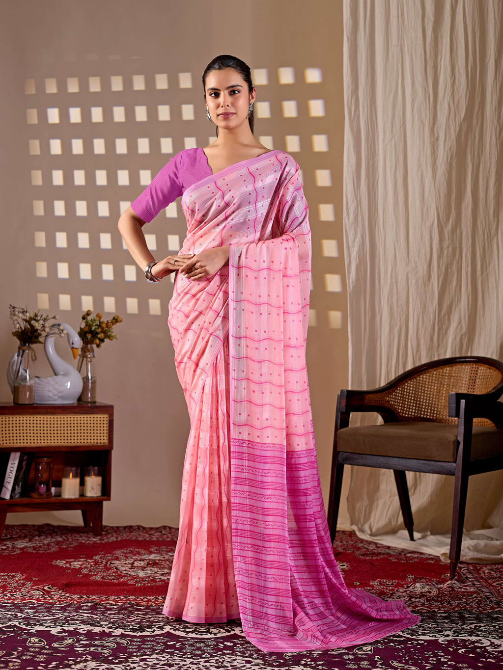 Pink Monsoon printed saree with matching blouse piece.
