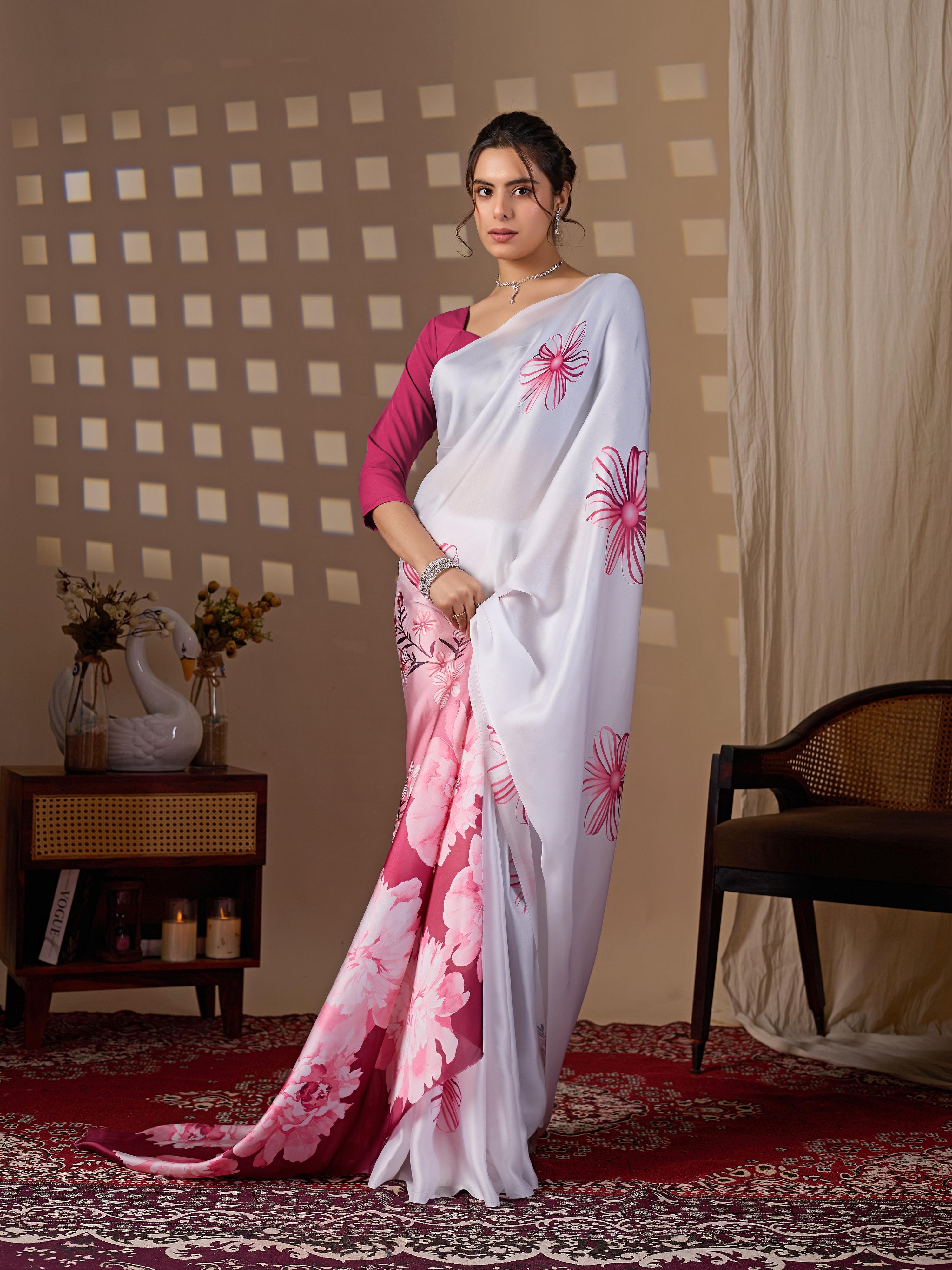 White soft satin saree with floral digital print and contrasting magenta blouse