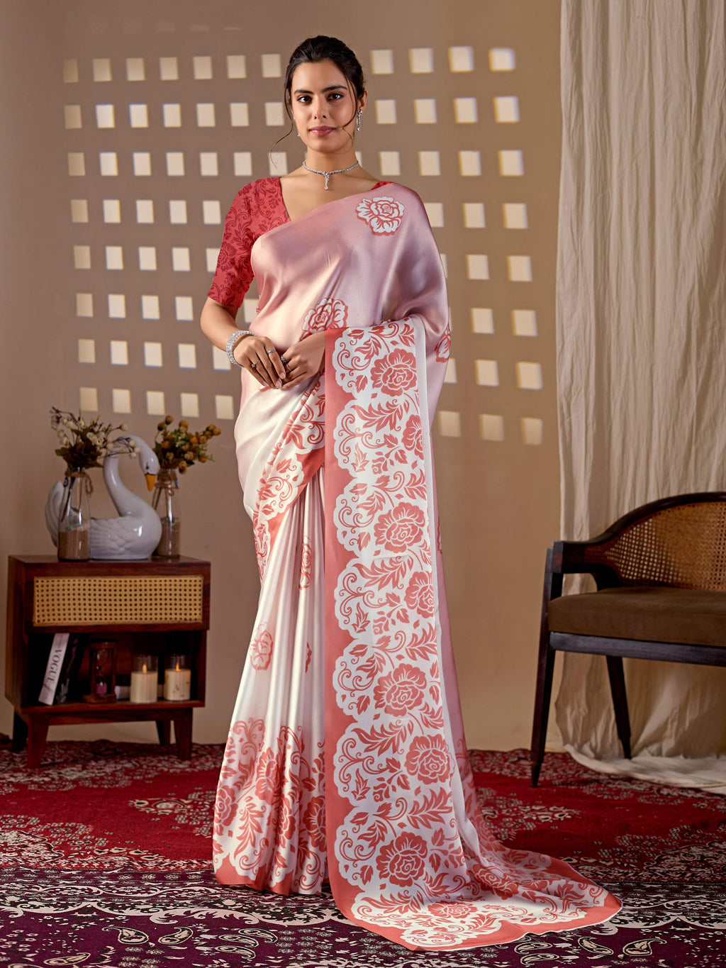 Peach soft satin georgette printed saree with red blouse draped elegantly
