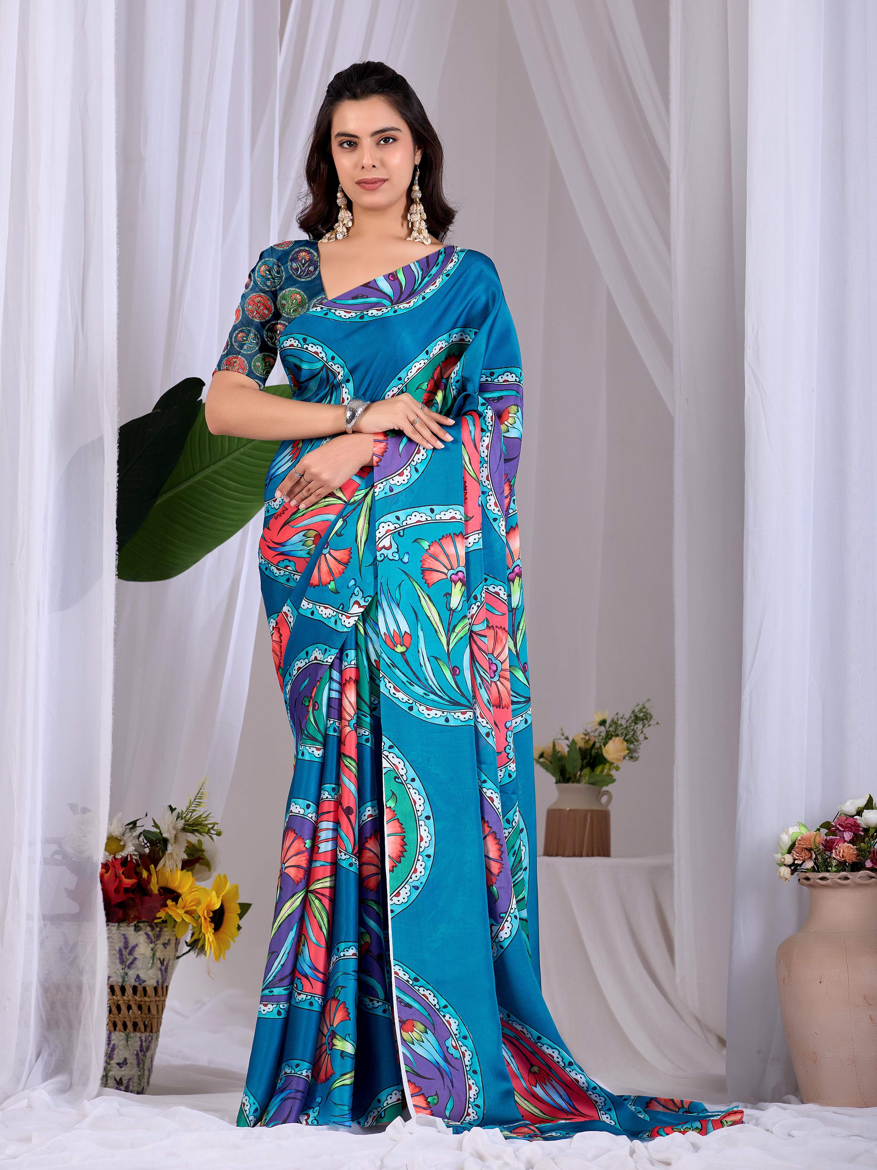 Elegant teal soft satin georgette printed saree with matching blouse piece