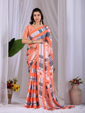 A vibrant Multi-Color soft satin georgette printed saree with a contrasting Peach blouse