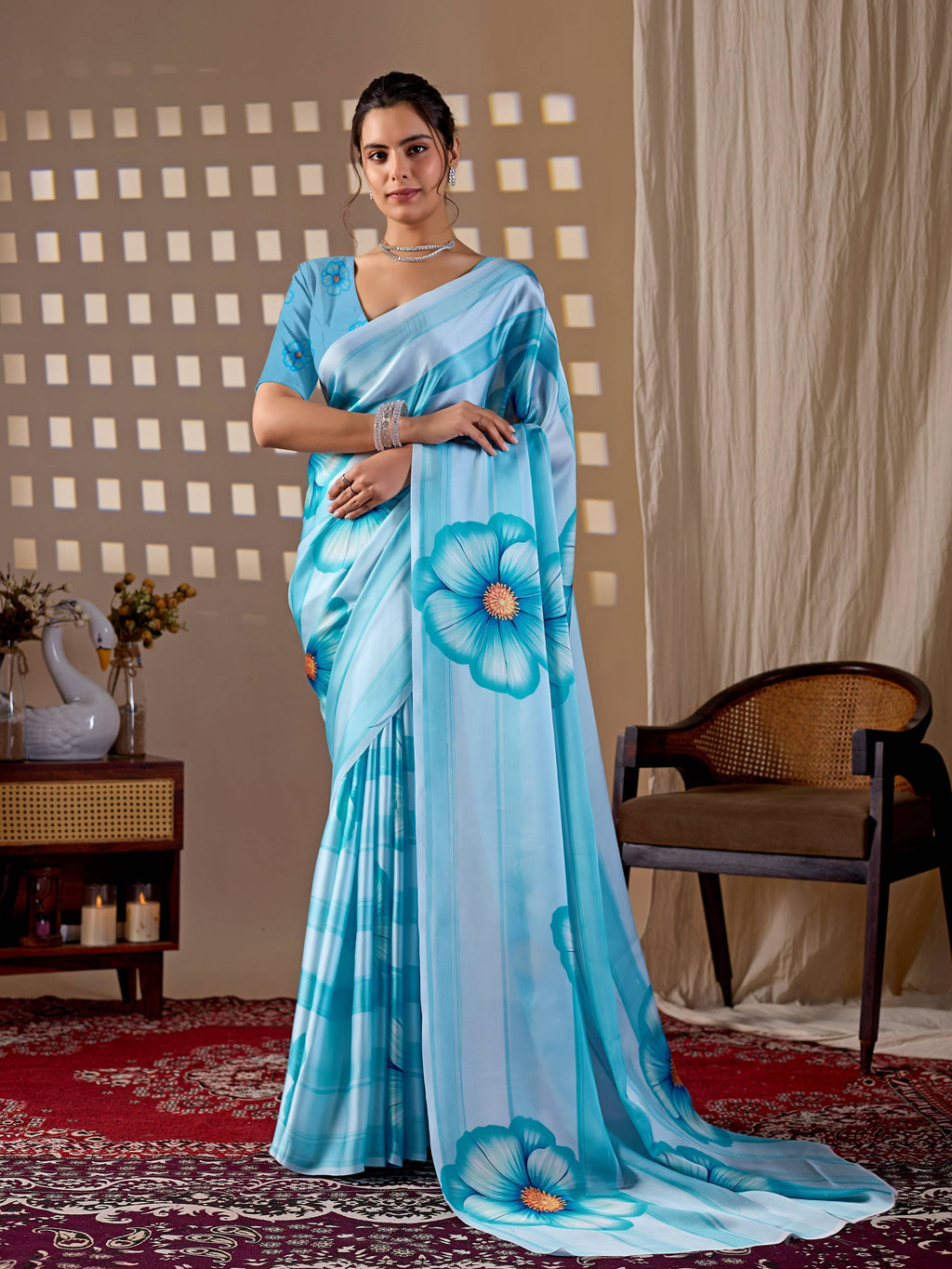 Aastha Fashion sky blue soft satin georgette printed saree with matching blouse piece
