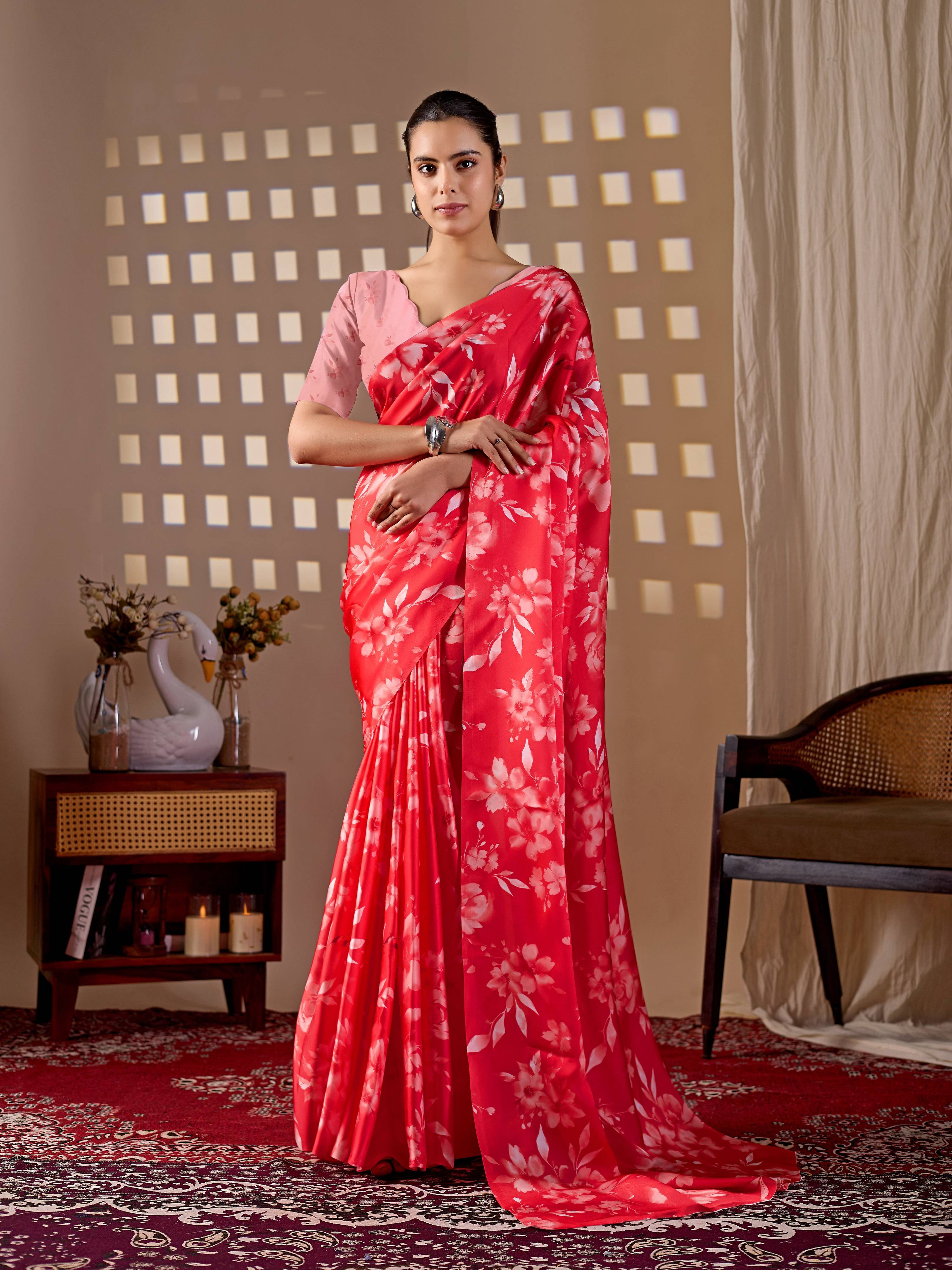 Red soft satin georgette printed saree with a peach blouse