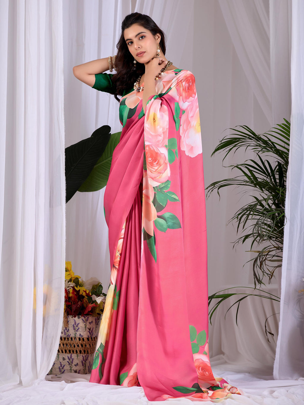 Pink soft satin georgette printed saree with a green blouse