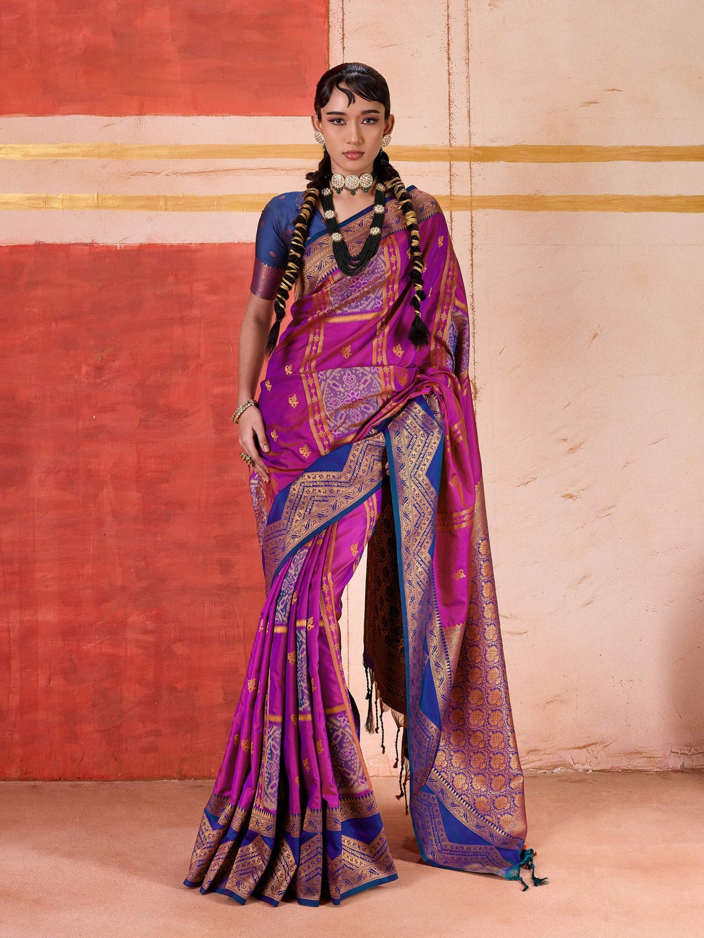 Aastha Fashion magenta pure silk handloom saree with a contrast blue blouse