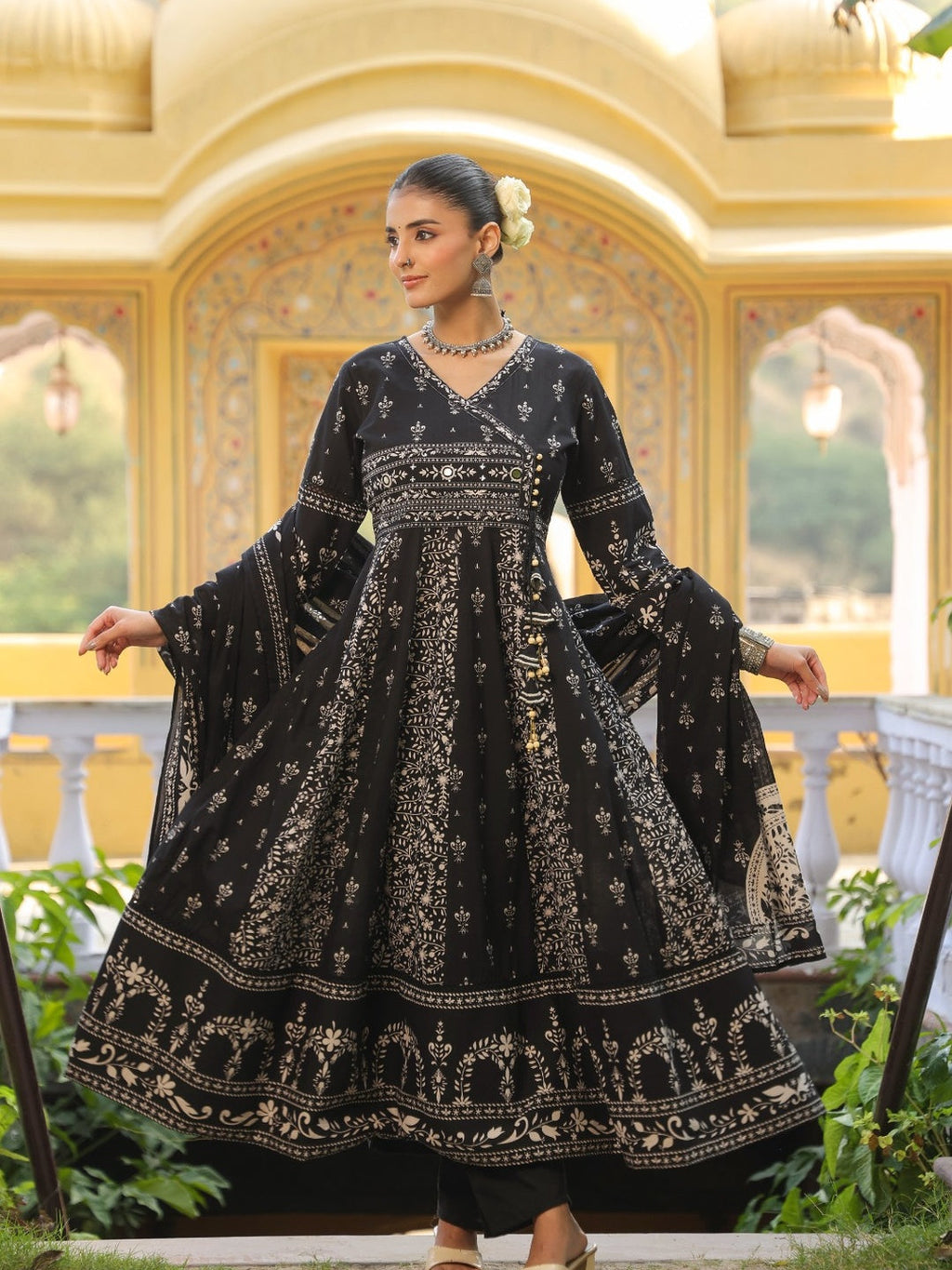 Black hand-embroidered Angarkha style Anarkali kurta with floral jaal print, matching pant, and dupatta.