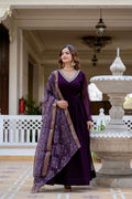 Wine colored faux georgette gown with pearl embellishments and matching dupatta